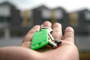A person holding keys 