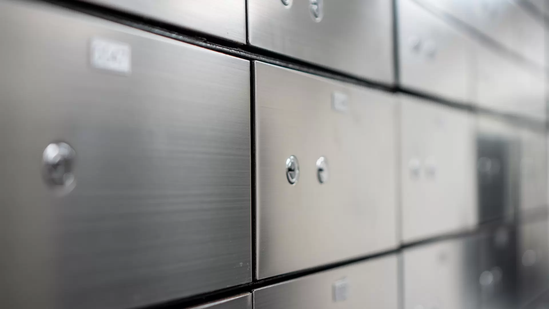Blurred Metal safe box panel wall. Concept for security and banking protection.